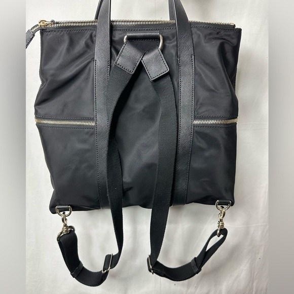 black leather jetsetter backpack Multi Compartment Travel Tote Cream Tons of interior and exterior pockets Henri Bendel Jetsetter Backpack Review